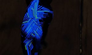 Glow in the dark costume detail. Ezra Dickinson performing in Psychic Radio Star, Danielle Blackwell Assistant Director